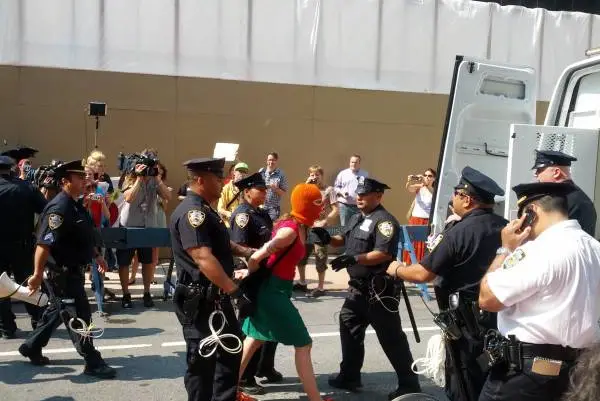 A protester is arrested outside the Russian Consulate in August